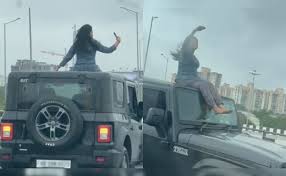 Dangerous stunt on the roof of a moving Thar in Gurugram — FIR, SUV seized and a big message